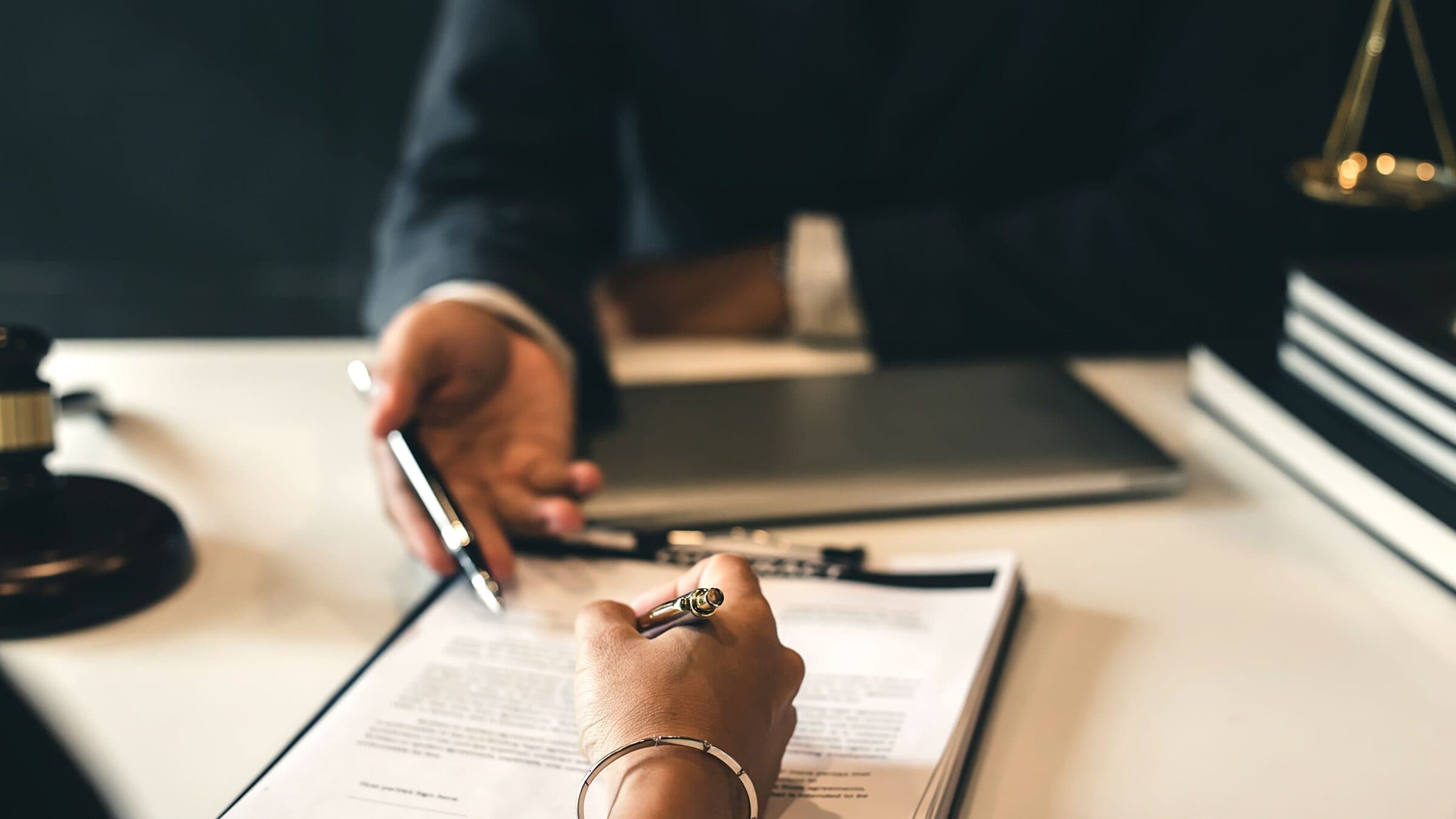 Reviewing paperwork at a desk